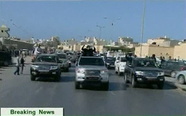 Negaranya Diserang, Khadafi Naik Mobil Sport