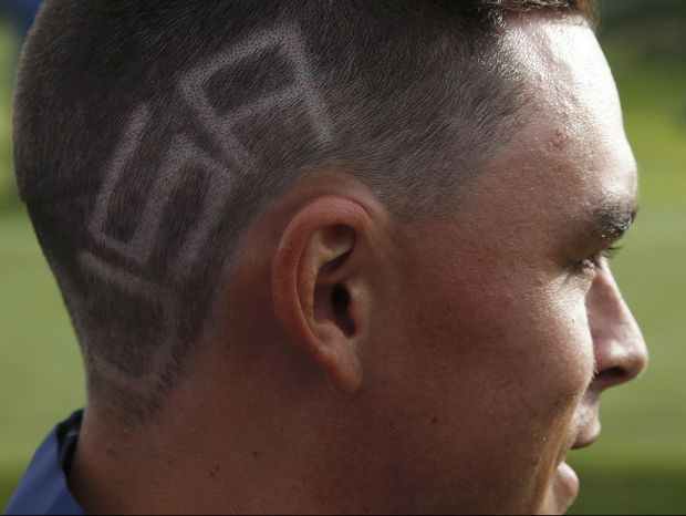 Pegolf Amerika Serikat, Rickie Fowler, menyiapkan potongan rambut berbeda untuk tampil di Piala Ryder (Eddie Keogh/Reuters)