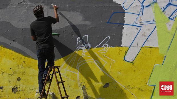 Seni grafiti yang memanfaatkan ruang publik membuatnya mudah dinikmati masyarakat.