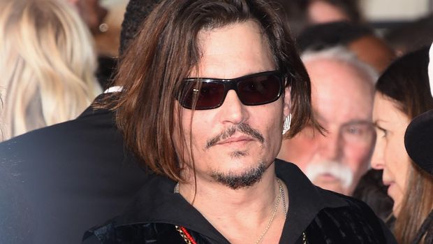 Di balik penampilan sangarnya, Johnny Depp ternyata punya koleksi barbie.
