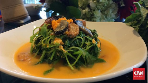 Spinach with salted egg and century egg in supreme stock