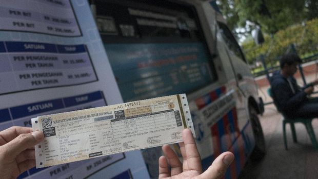 Pengemudi taksi online nantinya juga harus punya STNK berbadan hukum.