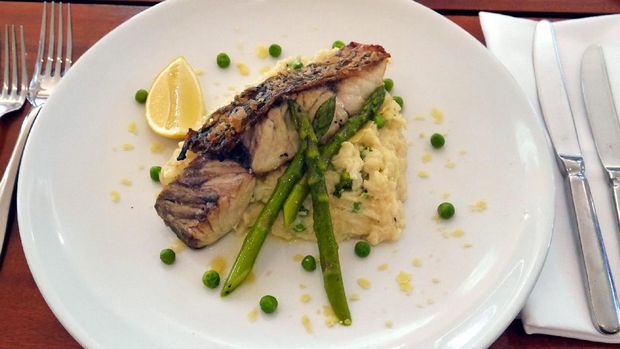 Hasil kuliner saya, risotto dengan ikan barramundi panggang. Enak lho! (Wahyu/detikTravel)