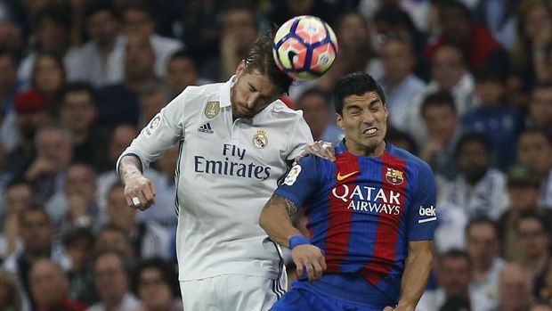 Luis Suarez selalu mendapatkan pengawalan ketat dari para pemain Madrid. (