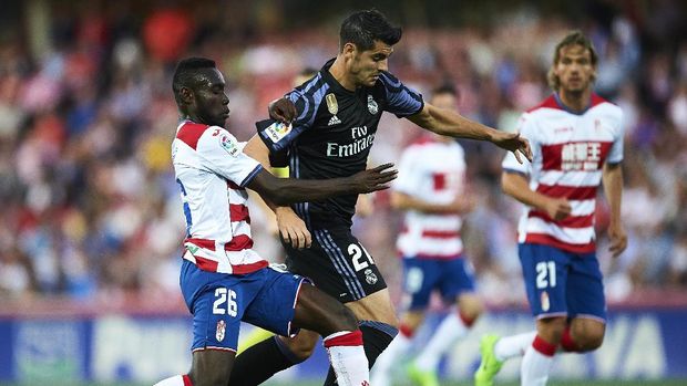 Alvaro Morata membuat dua gol dalam kemenangan Real Madrid atas Granada 4-0, Minggu ( 