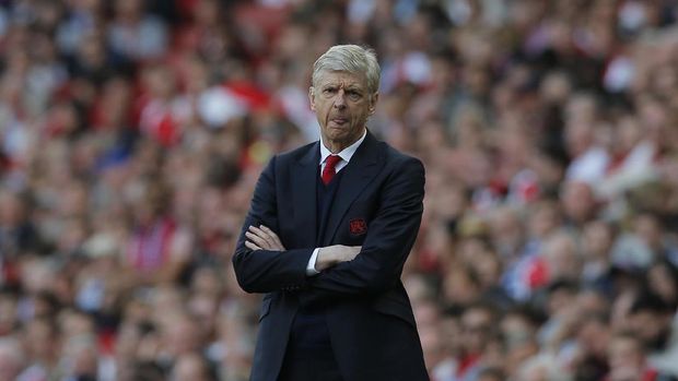 Arsene Wenger sudah 21 tahun melatih Arsenal.