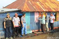 Pengecatan kampung Musi Bercorak (Raja Adil/detikTravel)