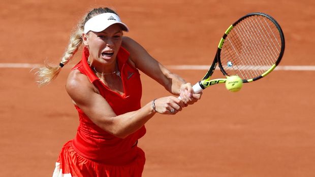 Muguruza Dipaksa Main Tiga Set, Wozniacki Menang <i>Double Bagel</i>