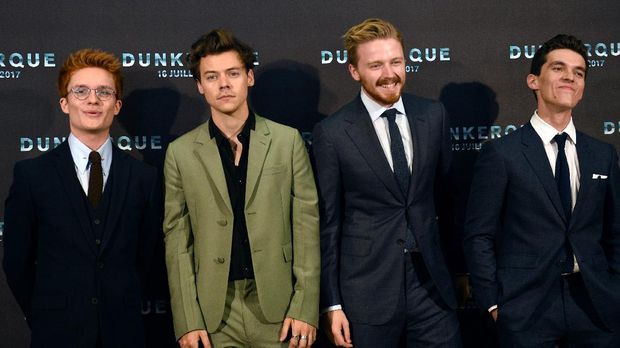 (From L) British actor Tom Glynn-Carney, British singer, songwriter and actor Harry Styles, British actor Jack Lowden and British actor Fionn Whitehead pose on July 16, 2017, during a photo-call at the cinema Ocine in Dunkirk, for the premier of the movie 