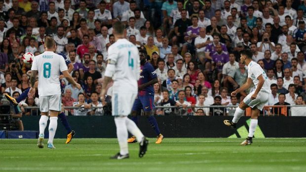 Marco Asensio membobol gawang Barcelona pada menit keempat.