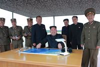 Kim Jong-Un memantau peluncuran rudal Korut.