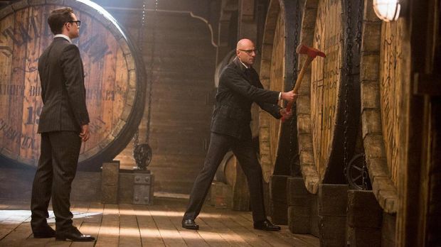 Mark Strong sebagai Merlin di Kingsman.