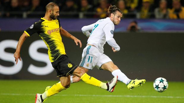 Real Madrid memuncaki klasemen Grup A, unggul selisih gol dari Tottenham Hotspur.