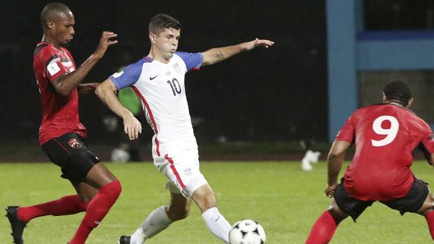 Amerika Serikat secara mengejutkan kalah 1-2 dari tim juru kunci, Trinidad dan Tobago, pada laga pamungkas kualifikasi Zona CONCACAF.