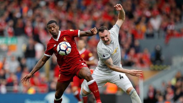 Manchester United harus puas bermain imbang tanpa gol lawan tuan rumah Liverpool. (
