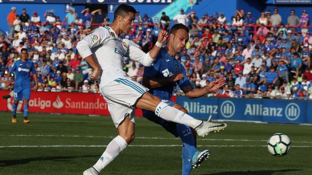 Cristian Ronaldo akhirnya mampu mengakhiri paceklik gol di La Liga Spanyol setelah mencetak gol ke gawang Getafe. (