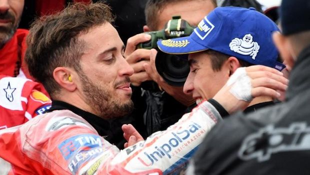 Marc Marquez dan Andrea Dovizioso terlibat pertarungan sengit di GP Jepang (15/10).