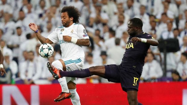 Real Madrid harus bersusah payah menghadapi serangan balik Tottenham Hotspur. (