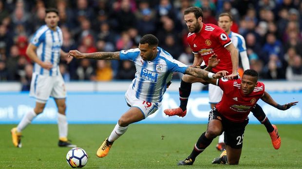 MU mengalami kekalahan mengejutkan dari Huddersfield Town pada pekan kesembilan Liga Primer Inggris musim ini.