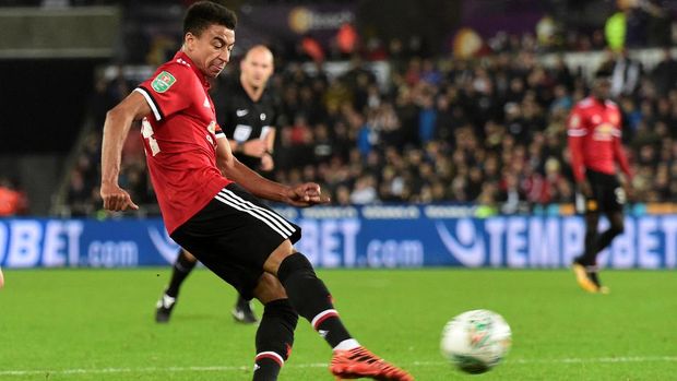 Jesse Lingard borong dua gol kemenangan Manchester United atas Swansea City di ajang Piala Liga, Selasa (24/10).