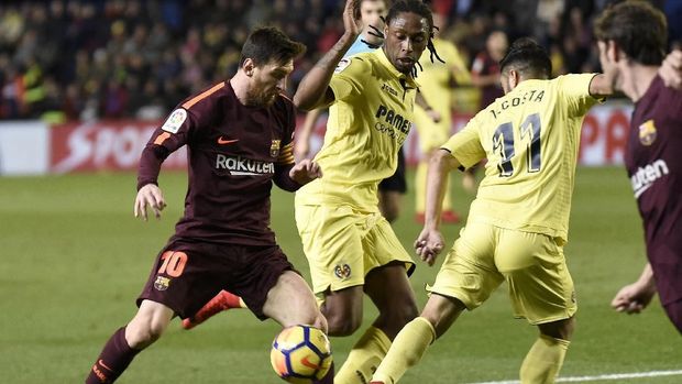 Lionel Messi kembali mencetak gol dan membantu Barcelona menang 2-0 atas Villarreal. (