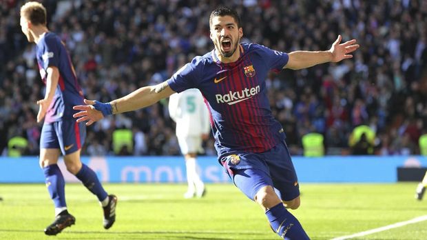 Luis Suarez merayakan gol ke gawang Real Madrid.
