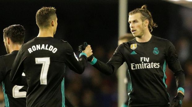 Gareth Bale (kanan) mencetak dua gol ke gawang Celta Vigo.