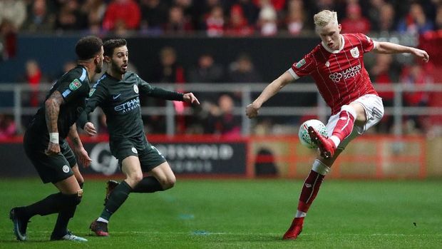 Manchester City menang 3-2 pada leg kedua di markas Bristol City. (